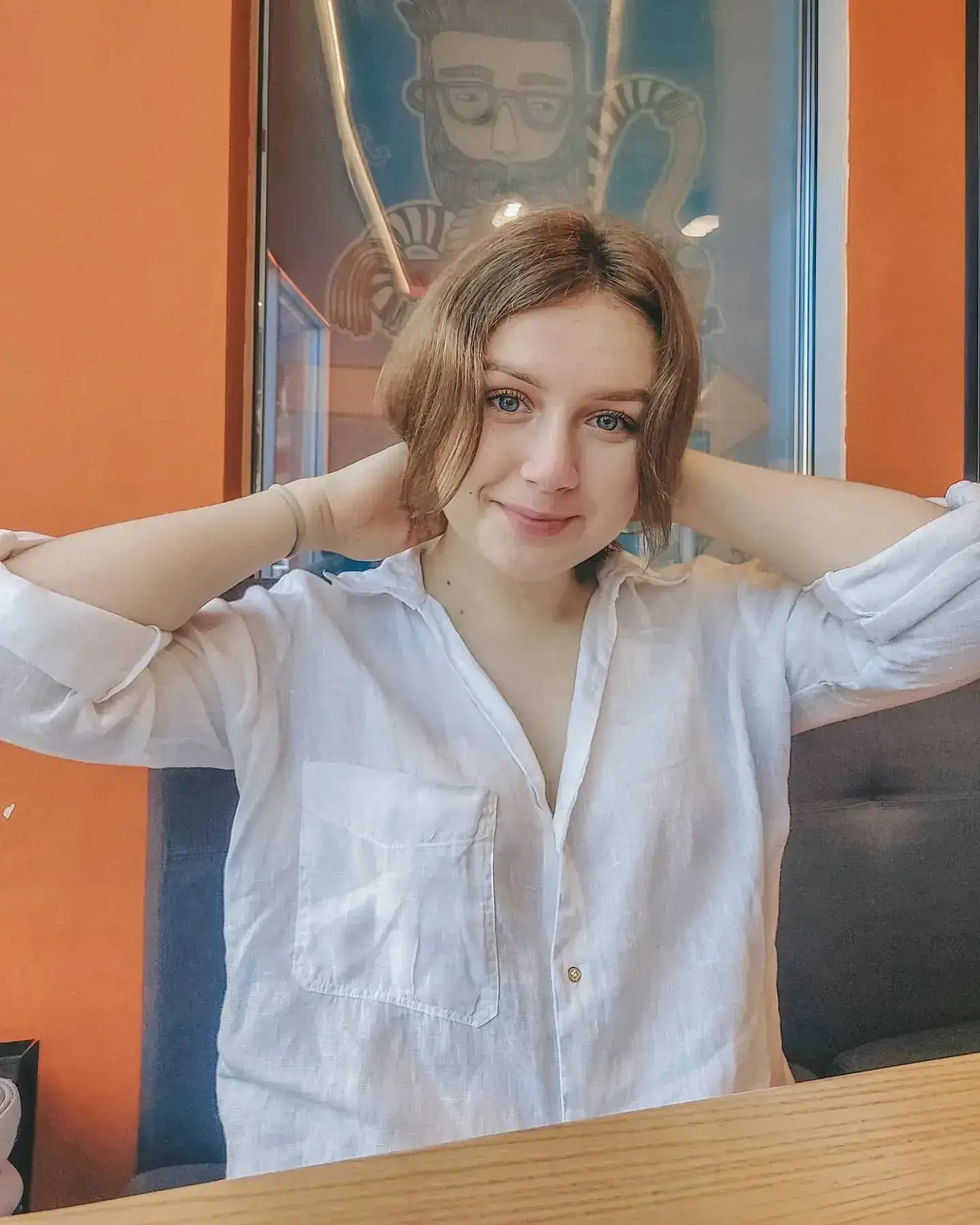 AI Headshot Generator: attach a few photos of yourself where you like how you look.
